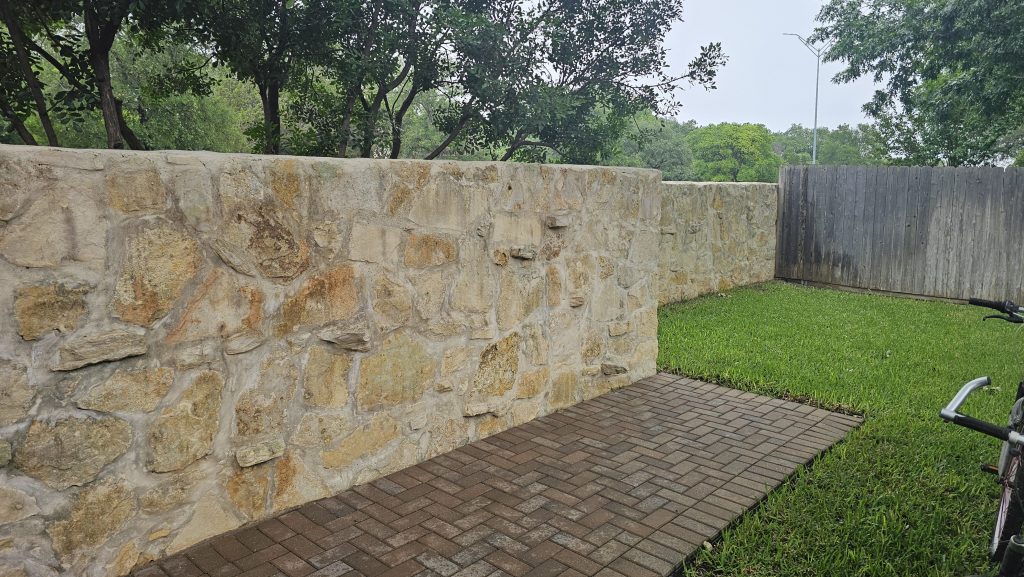 Soft Washed stone wall in San Antonio